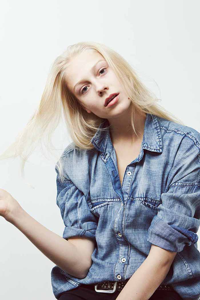 blonde female model wearing denim