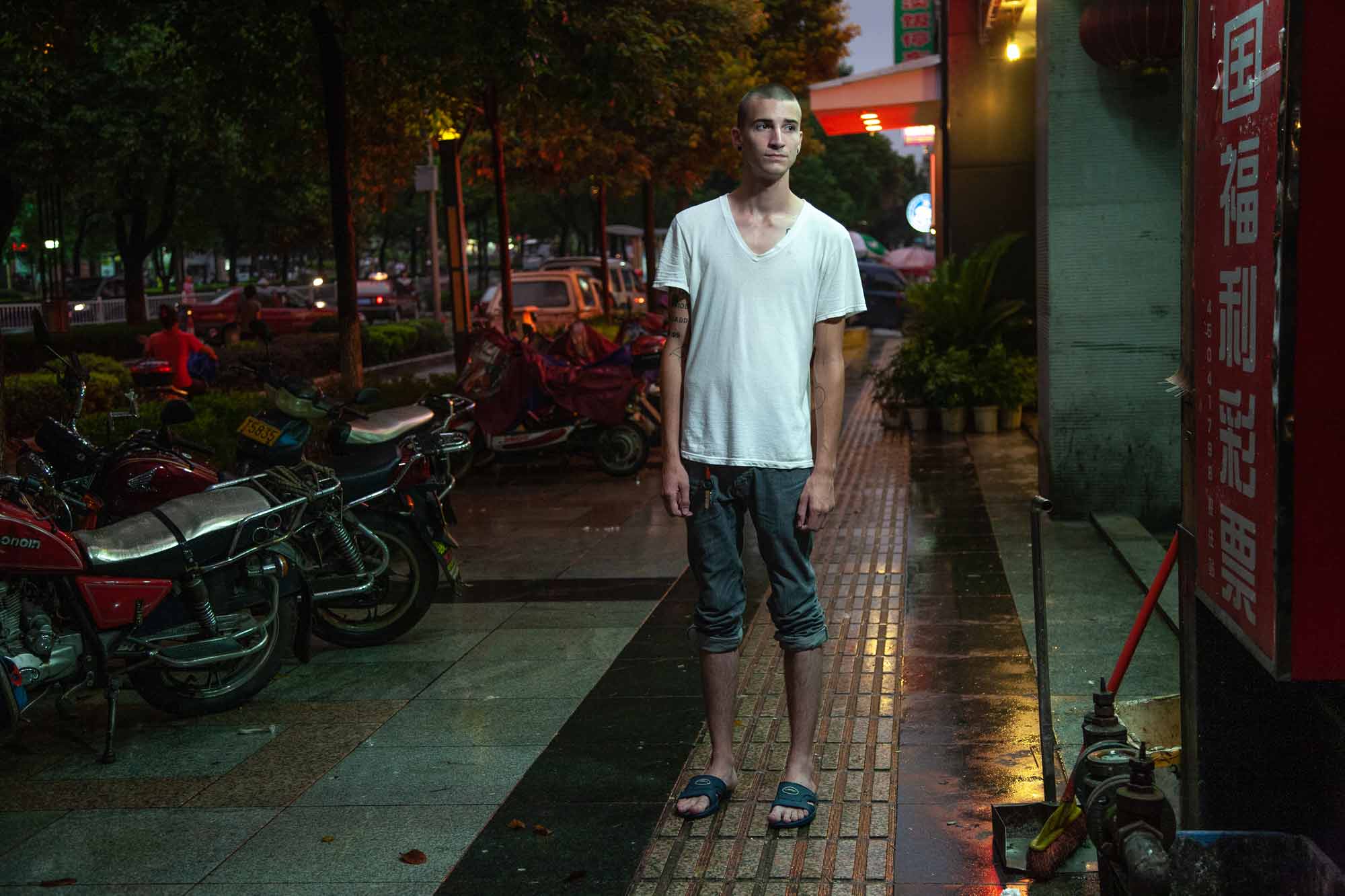 a hard light portrait of an expat living in China