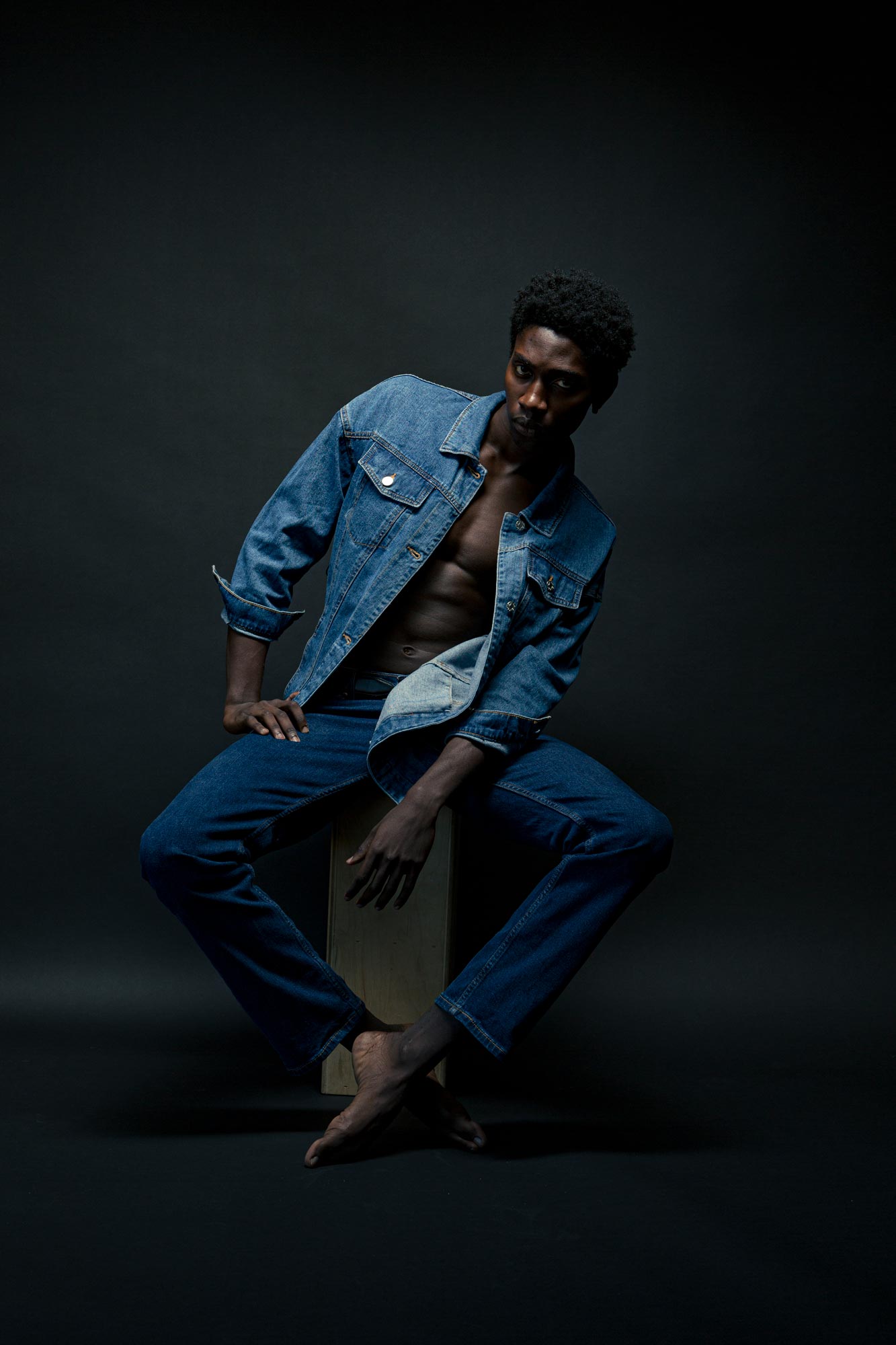 Ekow Botchway posing for a fashion photo shoot with Jeff Fried