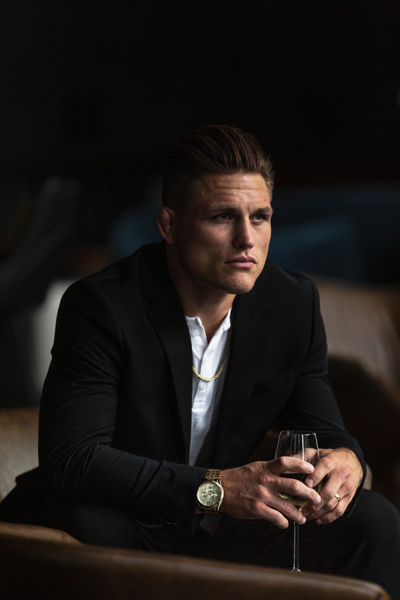 A photograph of by Jeff Fried of UFC Fighter, Drew Dober looking like James Bond