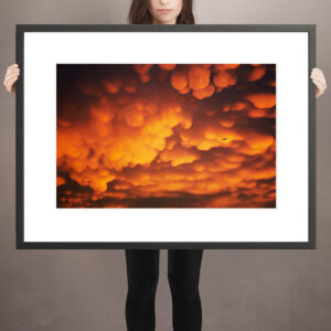 model holding framed mammatus limited edition print