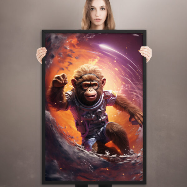model holding a framed print of a surfing astronaut monkey